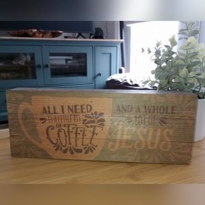 "All I need is a little bit of coffee and a whole lot of Jesus" wood sign.
